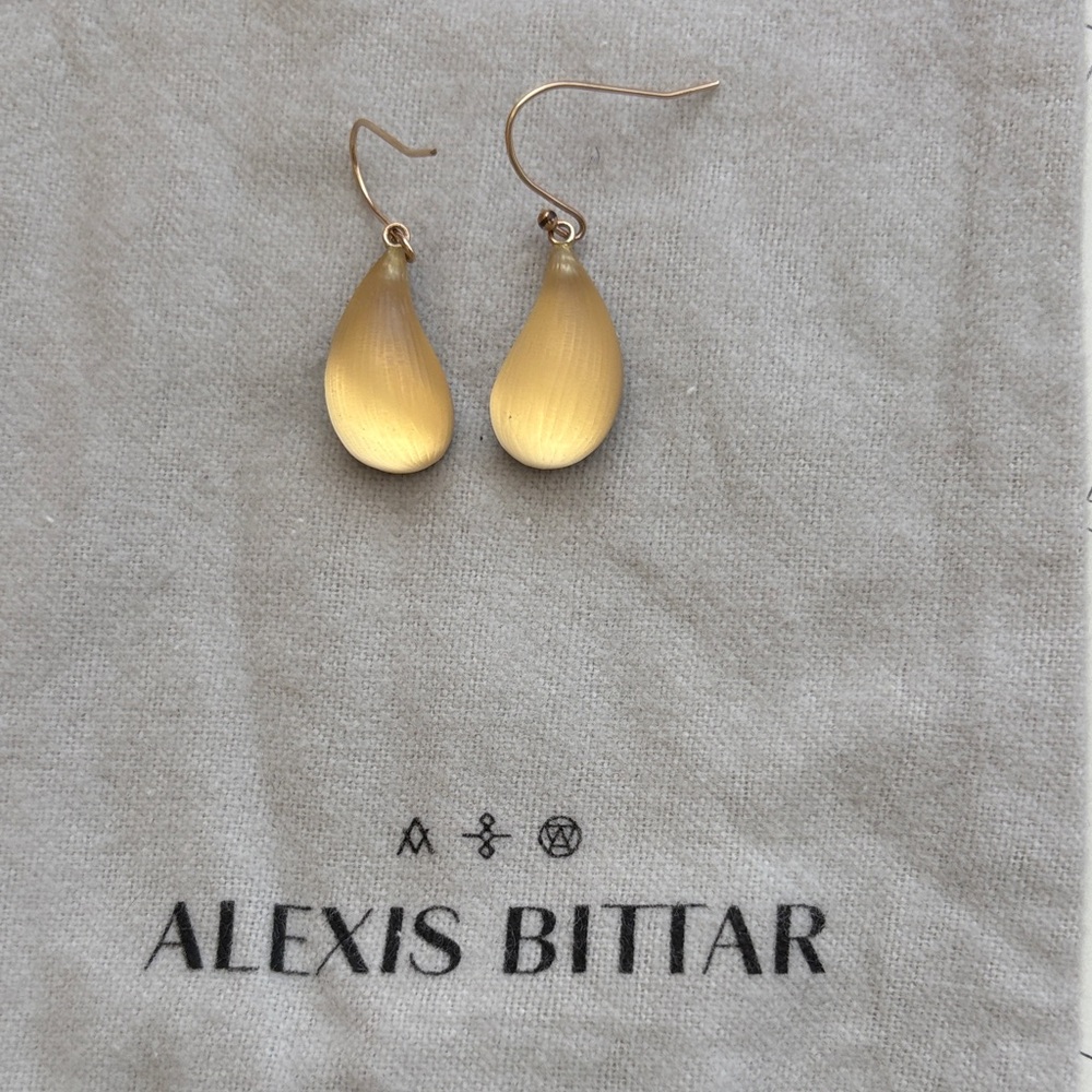 Alexis Bittar dew drop earrings.